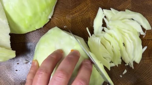 Cabbage Quarter Sliced into Thin Pieces