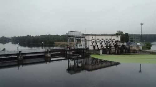 Small Power Plant on the River View From Height of the Dam System Energy Extraction Aerial View