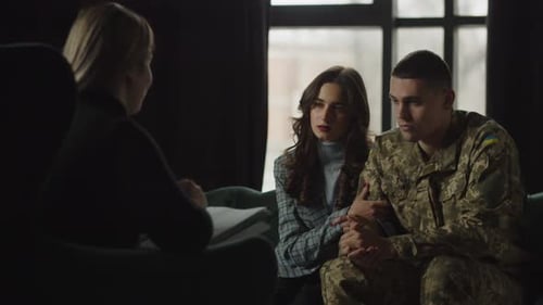 Couple Attends Therapy Session with Counselor