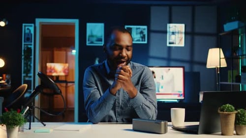 Man Presenting Product in Home Office Studio