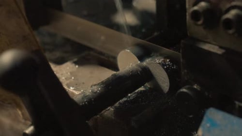 Close up view of the water cooling of a CNC cutting