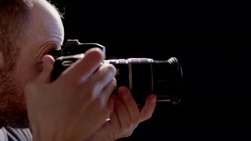 Man uses DSLR Camera, Close Up