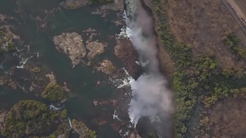 Vertical overhead view of world famous Victoria Falls mist in Africa