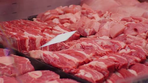 Raw pork uncooked meat organic food for barbecue in shop.