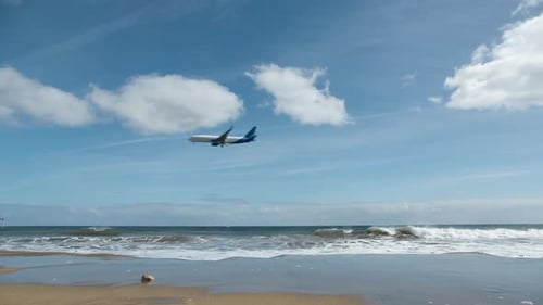 Commercial Plane Flying Over Sea