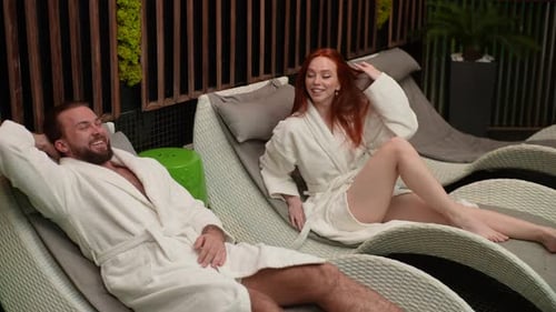 Couple Relaxing and Talking in Spa Lounge