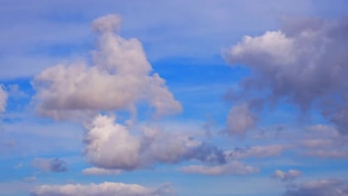 White Clouds against Bright Blue Sky during Daytime