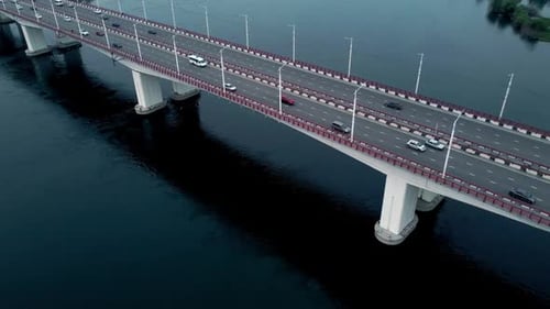 Top View of Cars Moves on Bridge Over Water Outdoors Irrl
