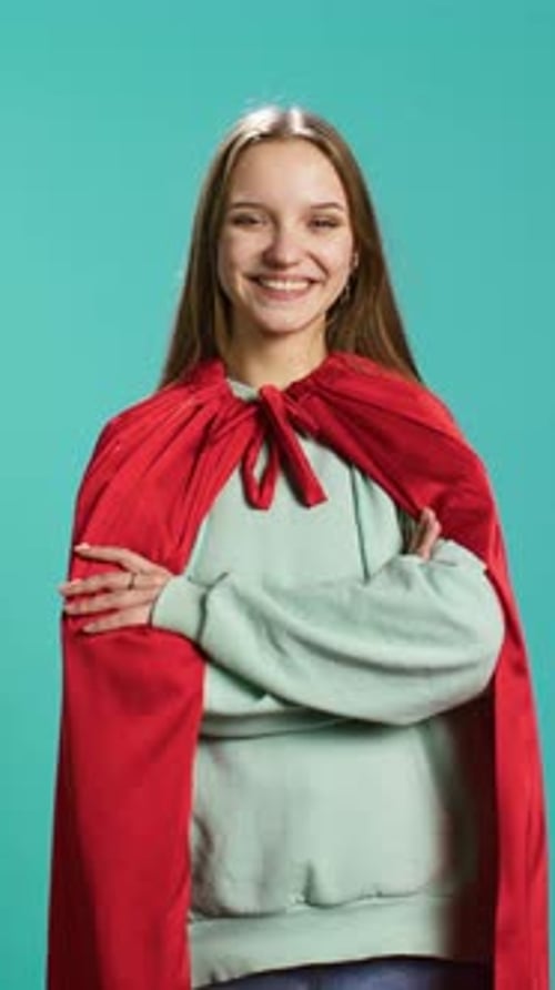 Vertical Video Portrait of Jolly Heroic Person Posing As Powerful Hero Character