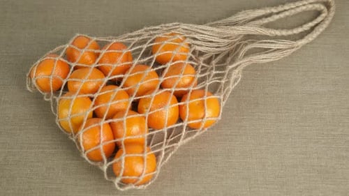 Eco Net con naranjas