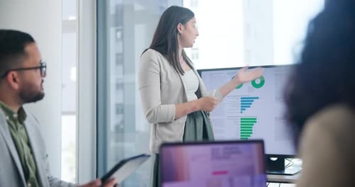 Business woman, team and presentation on tv with statistics, data or financial analysis in office