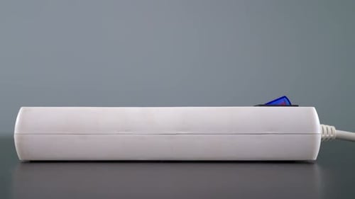 Plugging in the power strip