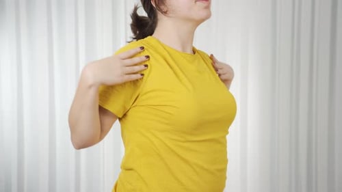 Neck and shoulder exercise.