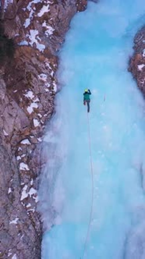 Ice Climbing Adventure on Frozen River From Above
