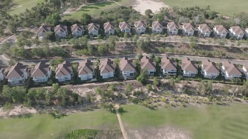 Aerial View of Tropical Homes and Golf Course