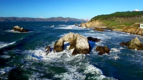 Drone View of Choppy Ocean and Rocks by San Francisco Beachside 7 Above
