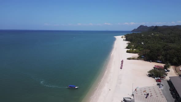parasols on Sand beach Rekreasi Kastam with turquoise water on Langkawi ...