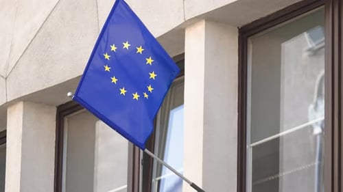 European Union Flag Waving on Building