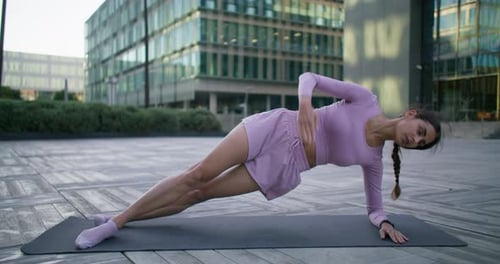 Female Fitness Instructor Dedicates Weekend to Sport Activity Does Side Plank Abdominal