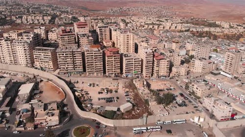 Aerial footage of Palestinian Refugge camp Surrounded By security Concerete Wall