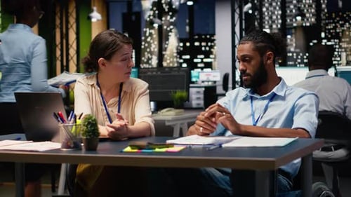 Cheerful Coworkers Doing Fist Bump Pleased By Business Results