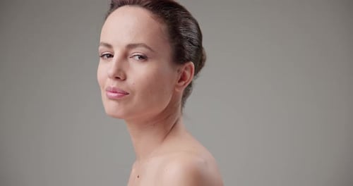 Woman Posing in Studio with Bare Shoulders