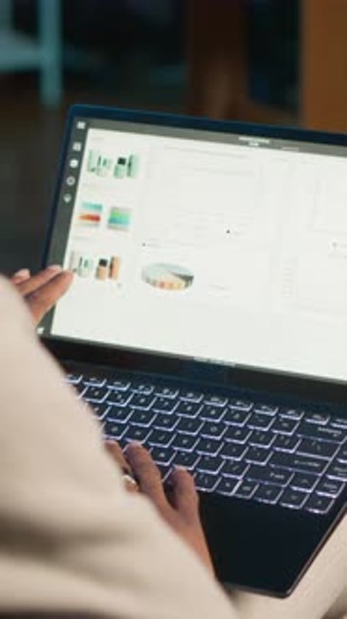 Vertical Video Remote Worker Accountant Doing Math Calculations Using Financial Graphs