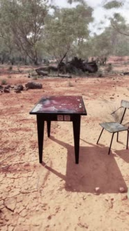 Old Ruster Metal Table in Desert