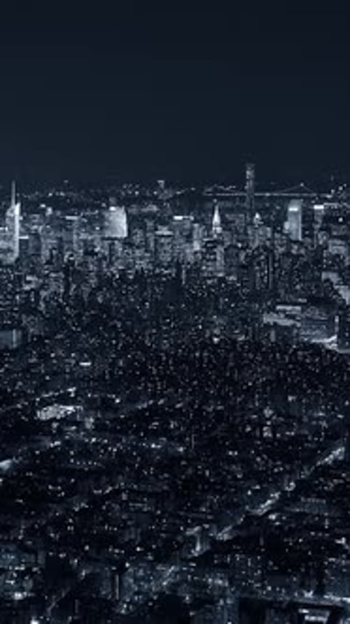 An Absolutely Stunning Aerial Night View of a Beautiful and Vibrant City Skyline