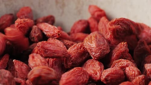 Bright Red Goji Berries Filling a Bowl
