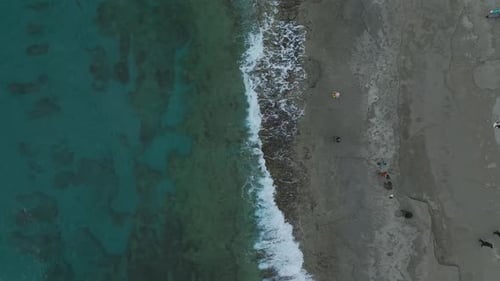 Aerial View of Rocky Beach and Turquoise Ocean