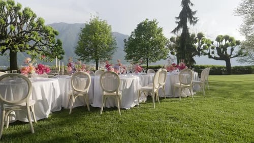 An Elegant Outdoor Dining Setup with a Scenic View Perfect for Any Occasion and Celebration Action