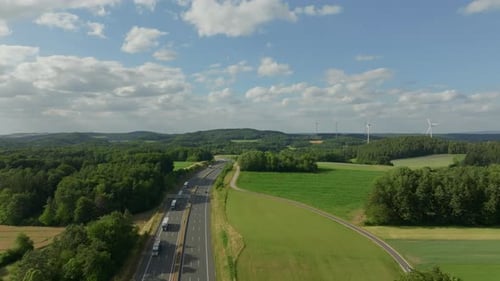 Aerial Footage of Highway and Wind Turbines in Austria