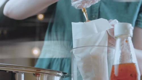 The Chef Puts the Mashed Potatoes in the Food Bag for the Forms