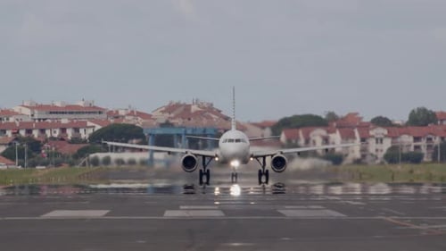 Airplane Taking Off From Runway
