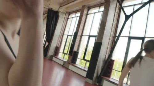 Female Dancers Performing Contemporary Improvisation in Studio