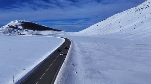 Aerial Drone View of Winter Road in Abruzzo Mountains Italy