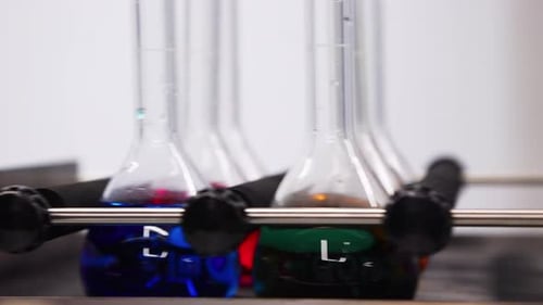 Rotating Science Flasks with Colorful Liquid Solutions
