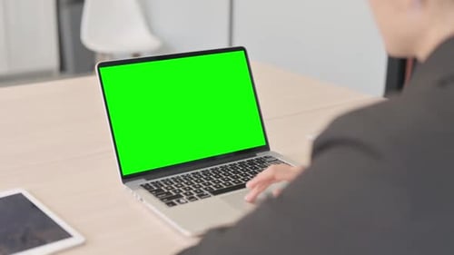Close Up of Businesswoman Using Laptop with Green Screen
