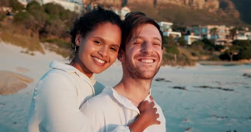 Face, hug and couple with affection, beach and romance for valentines day on trip