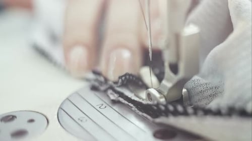 Close-Up of Sewing Machine Stitching Fabric