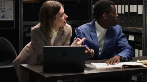 Office Workers Collaborate on Project Together