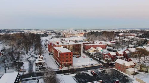 Snowy Suburban Town Aerial Shot in the Winter