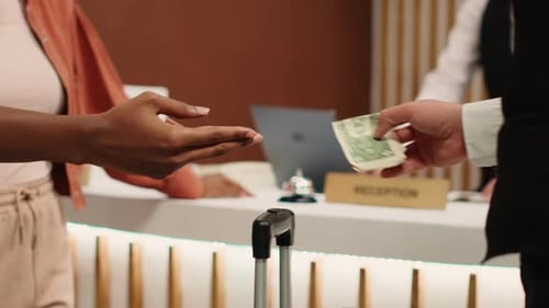 Thankful Hotel Guest Tipping Bellboy