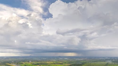 Hyperlapse 4K video of rainstorms and dark clouds moving over the central plains of Thailand.