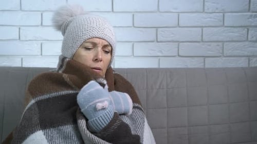 Femme endettée pour le chauffage central