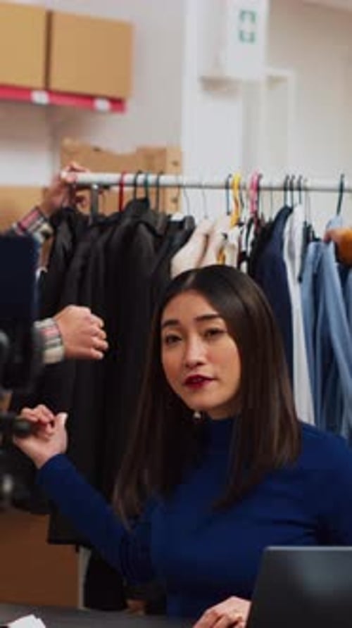 Vertical Video Team of Employees Promoting Retail Store Goods Online