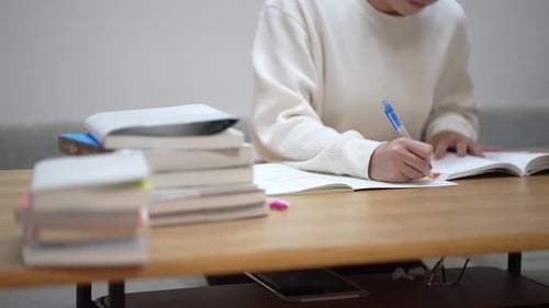 Young Adult Learning at Home with Books