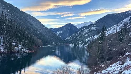 Mountain lake with turquoise water. Aerial view of scenery mountain lake. Famous Big Almaty lake