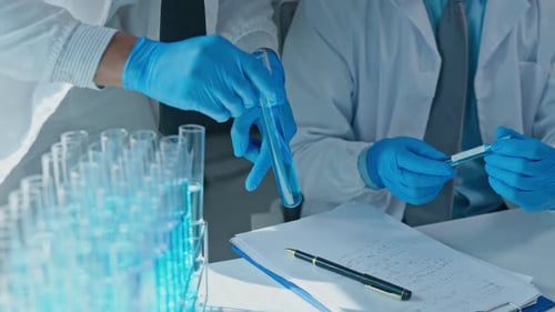 Scientists working test in laboratory for research on pharmacy for medical for disease and virus